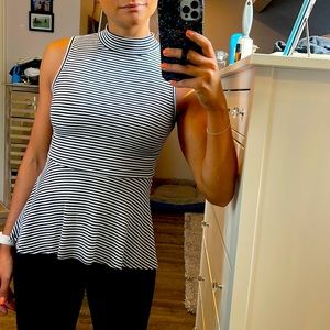 Super cute black and white striped peplum top.